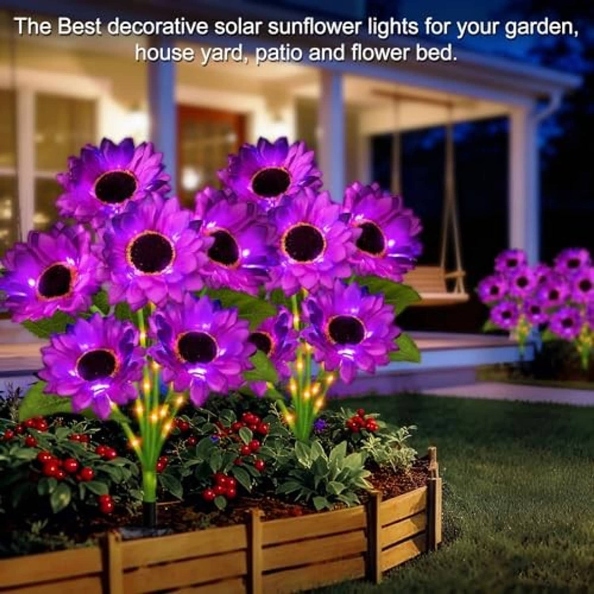 Purple sunflower solar lights along a yard flower bed with a black stake base.