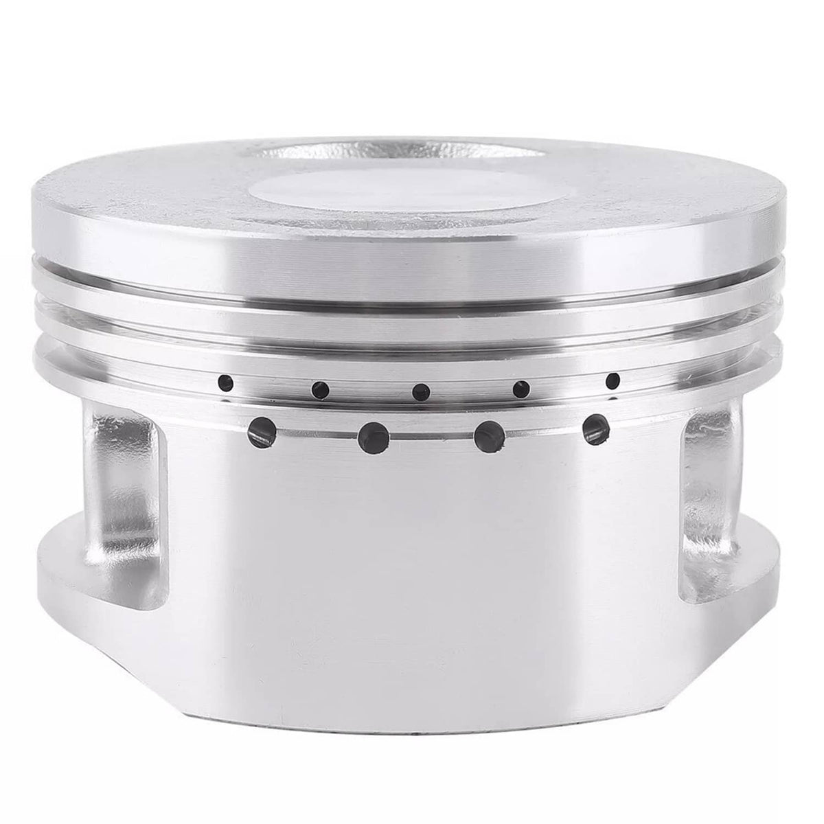 Silver piston with ring grooves and side skirt, close-up