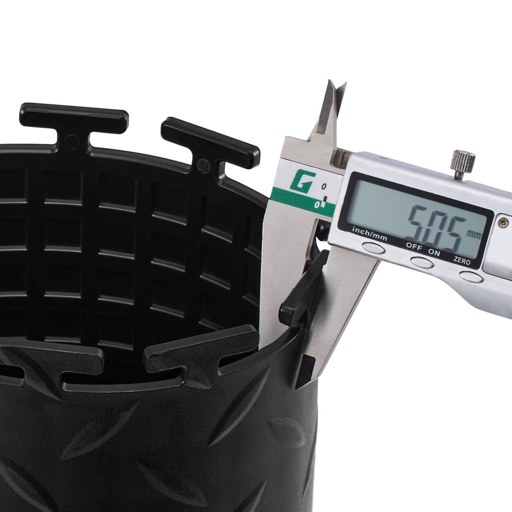 Black PVC interlocking floor tile edge detail, measured with caliper for thickness