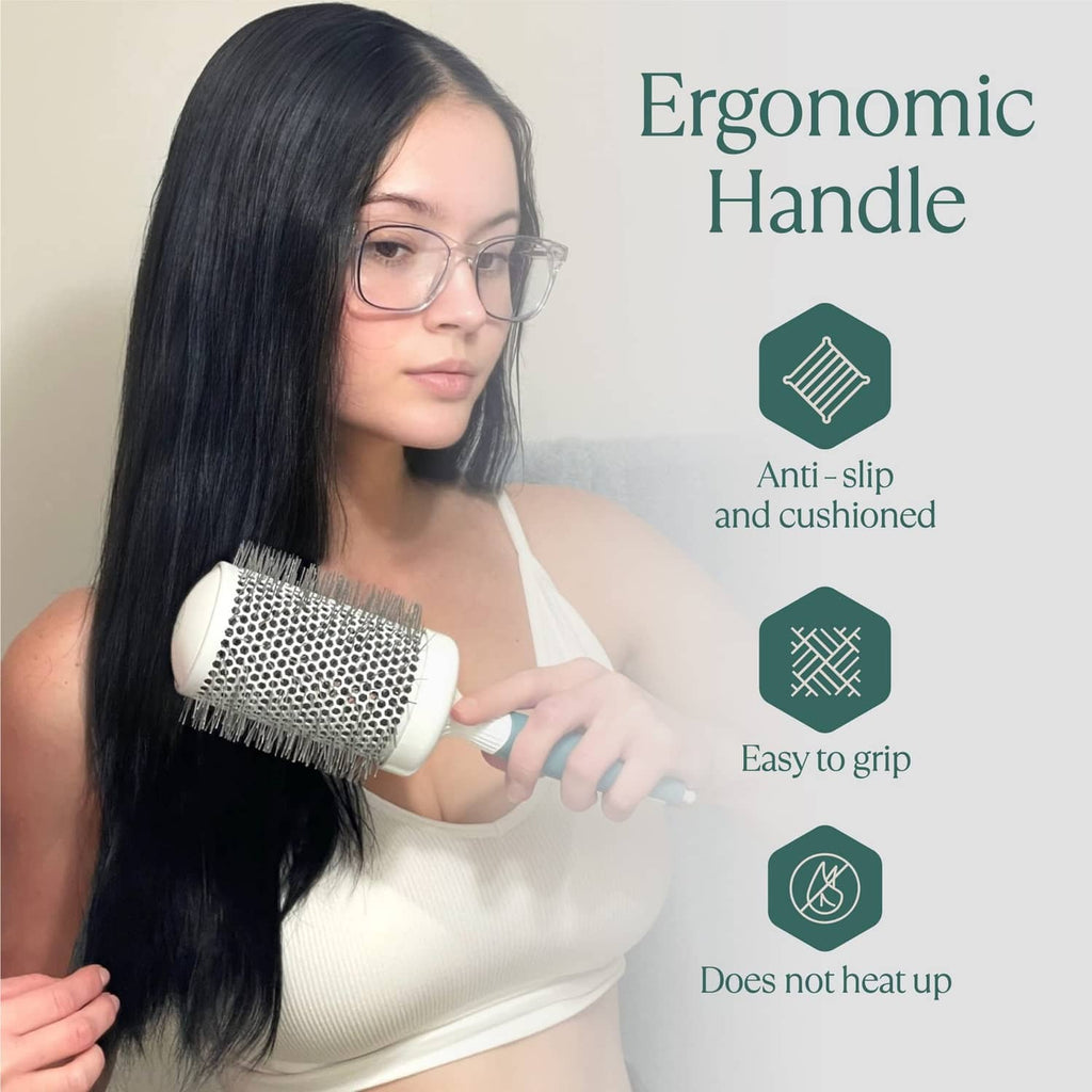Round ceramic hair brush with ergonomic teal handle, anti-slip grip, silver bristles