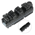 Left driver door window switch panel with multiple window buttons and mirror control knob