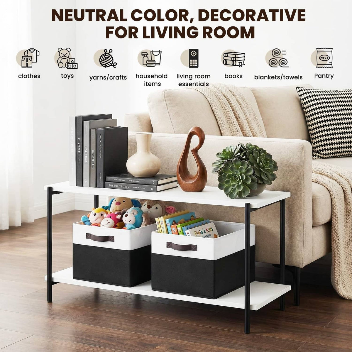 Living room storage bins on table: white-top, black-bottom rectangular baskets with handles
