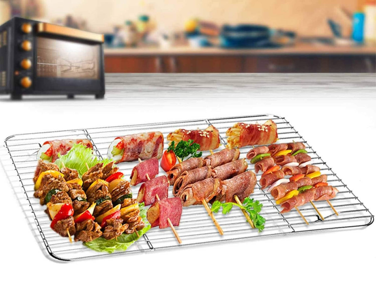 Stainless steel wire roasting rack tray with grilled kebabs and vegetables