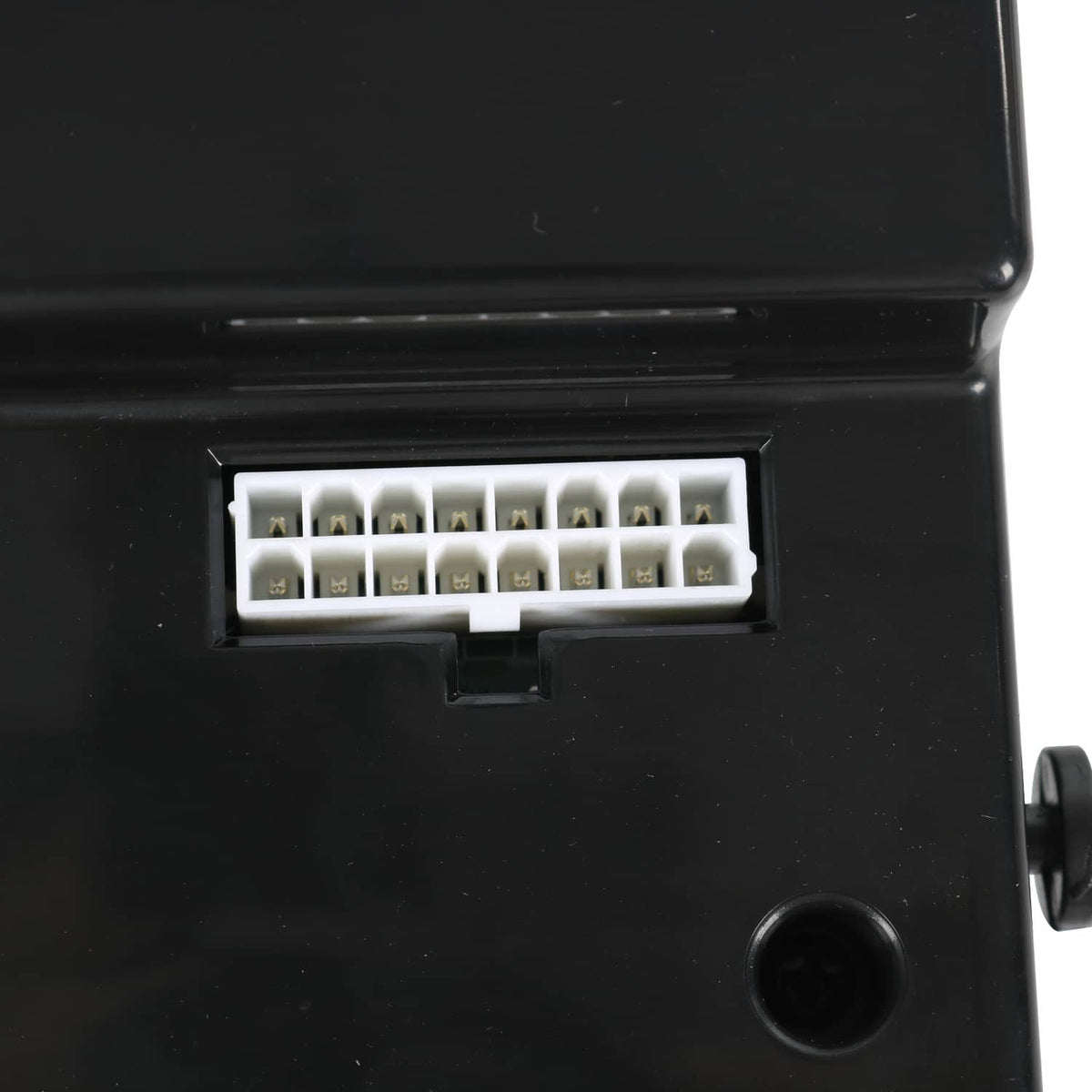 Black controller assembly close-up of multi-pin white wiring connector block