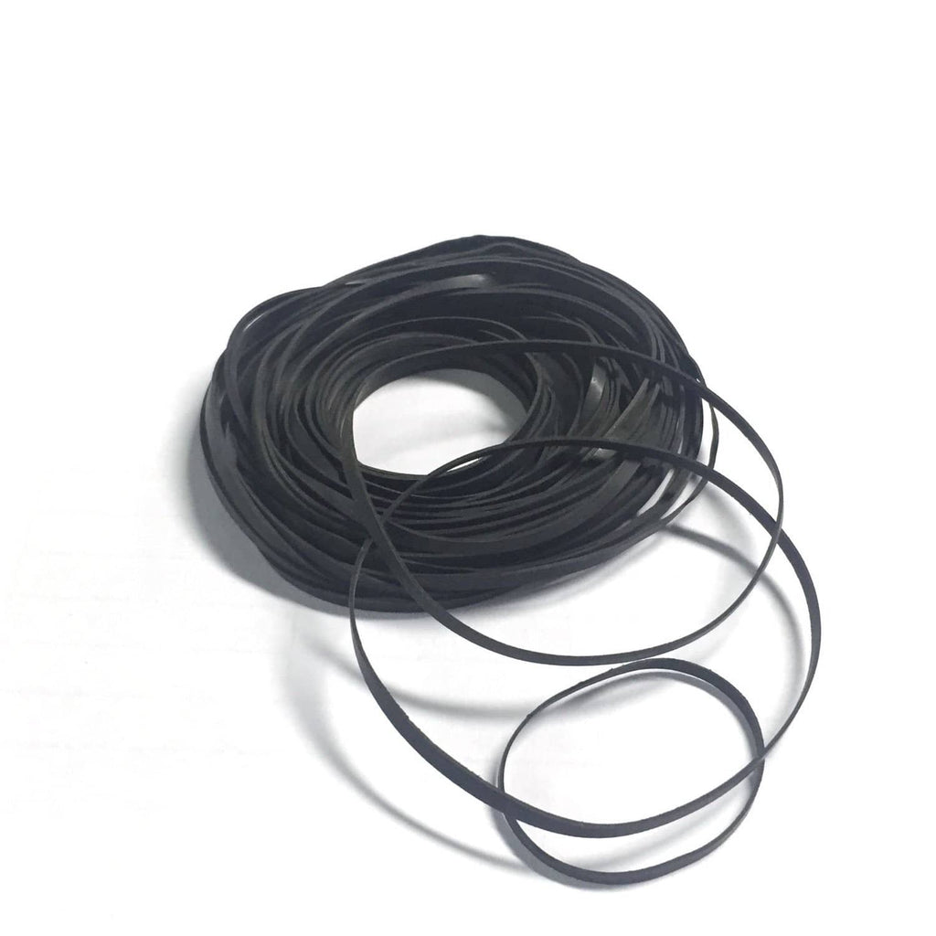 Black rubber flat belts, coiled roll for cassette belt drive repair