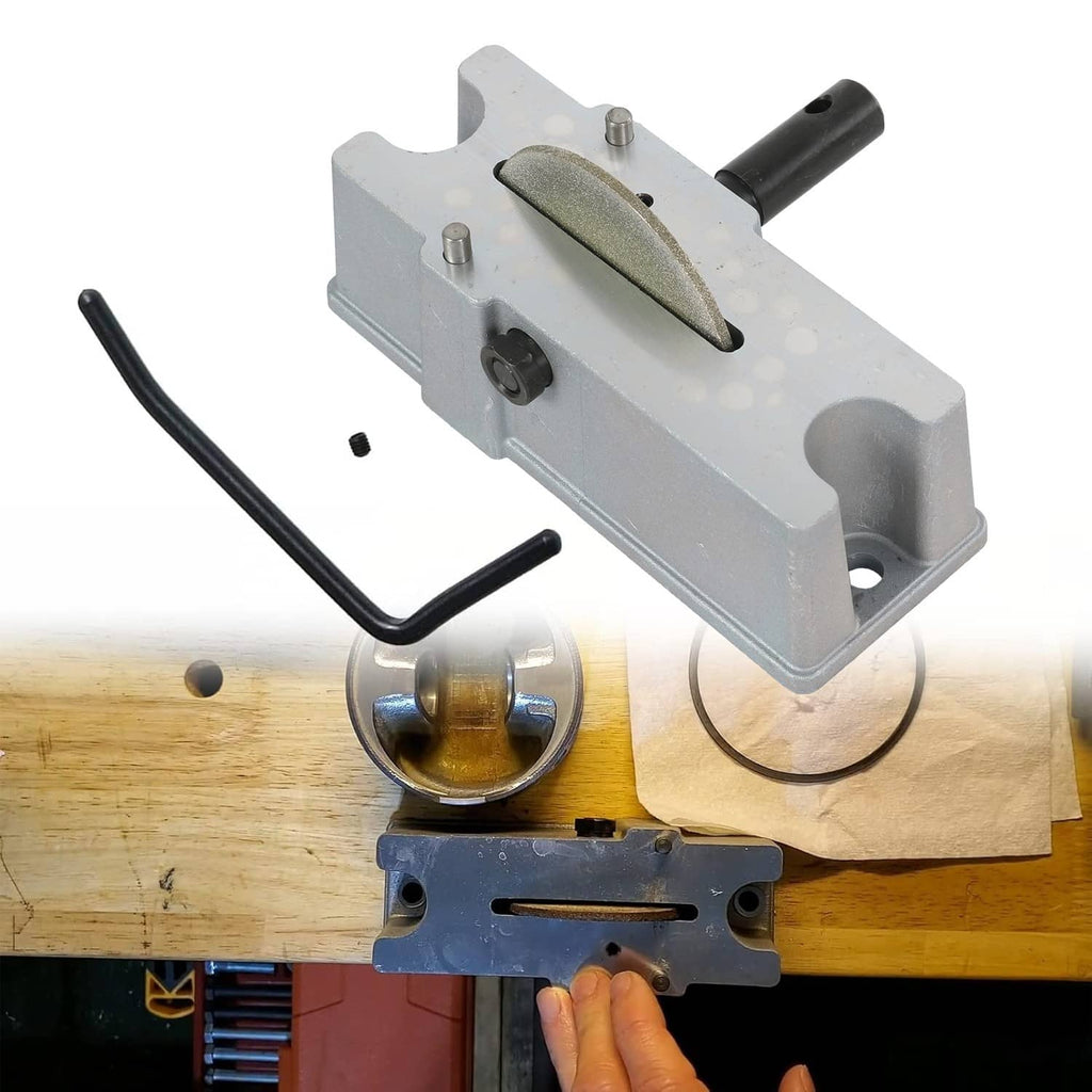 Manual piston ring grinder tool with abrasive wheel, side handle, and mounting frame