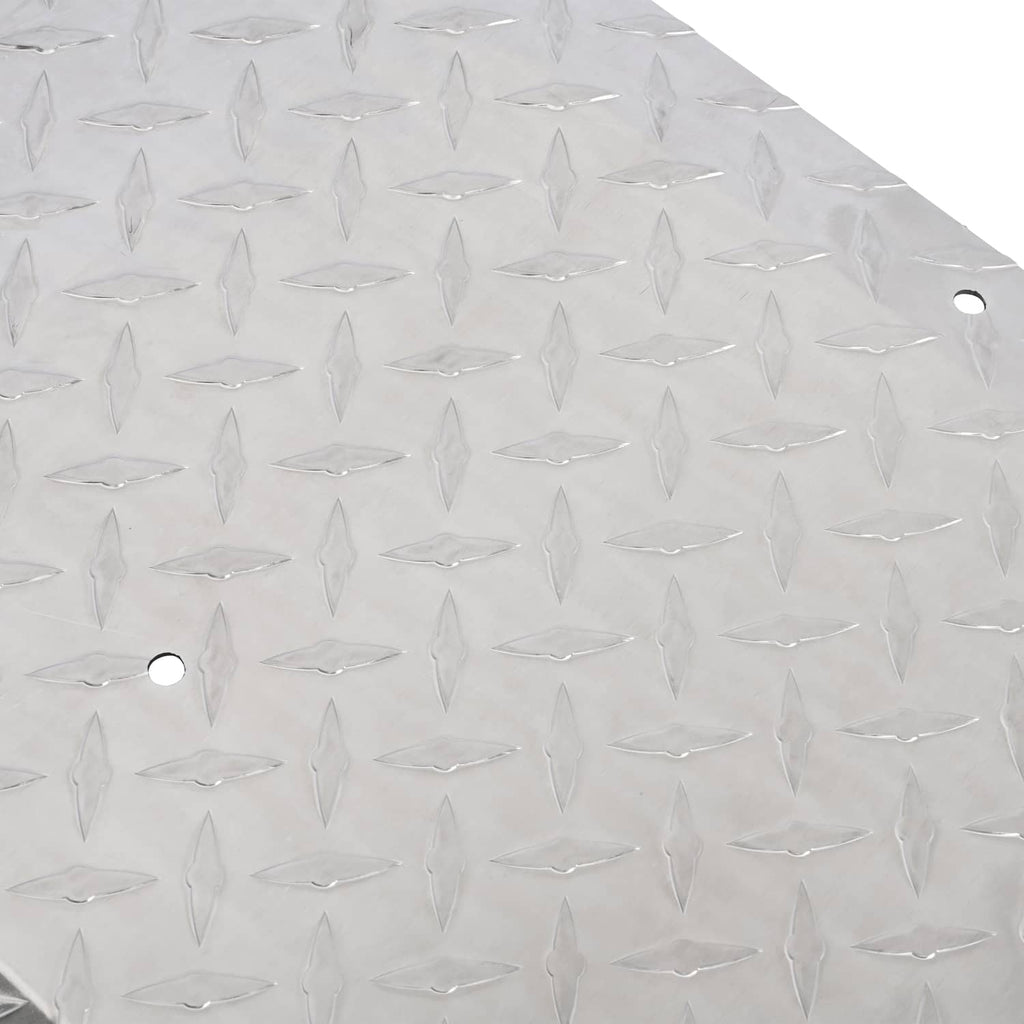 Aluminum diamond plate texture sheet with repeated diamond shapes and round mounting holes