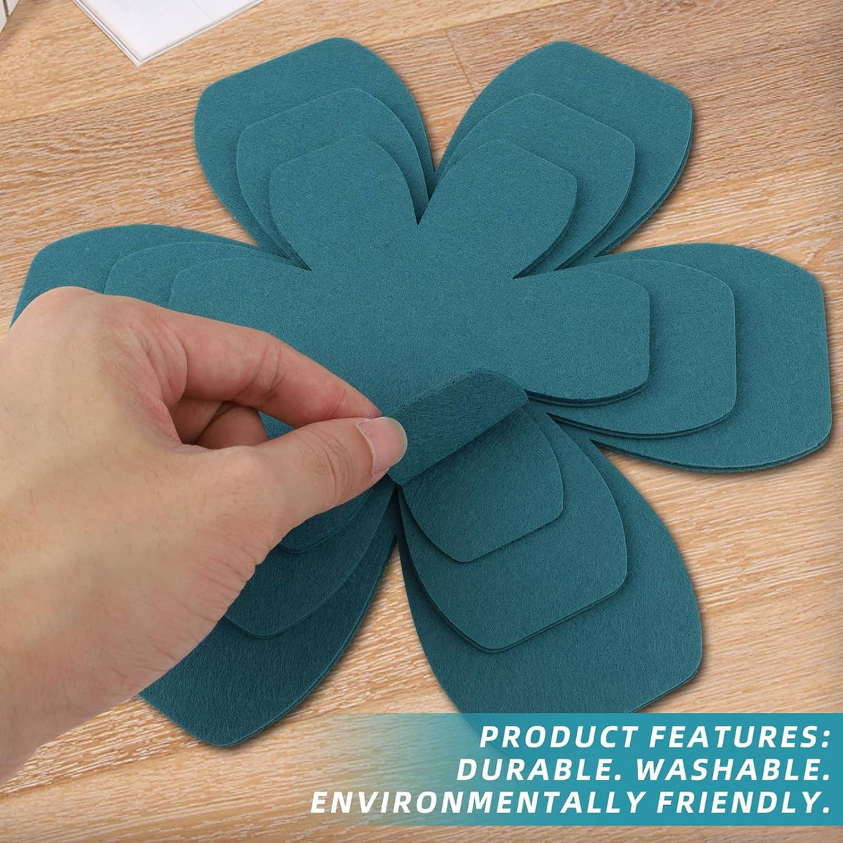 Teal felt pot and pan protector pads, large flower separator held by hand