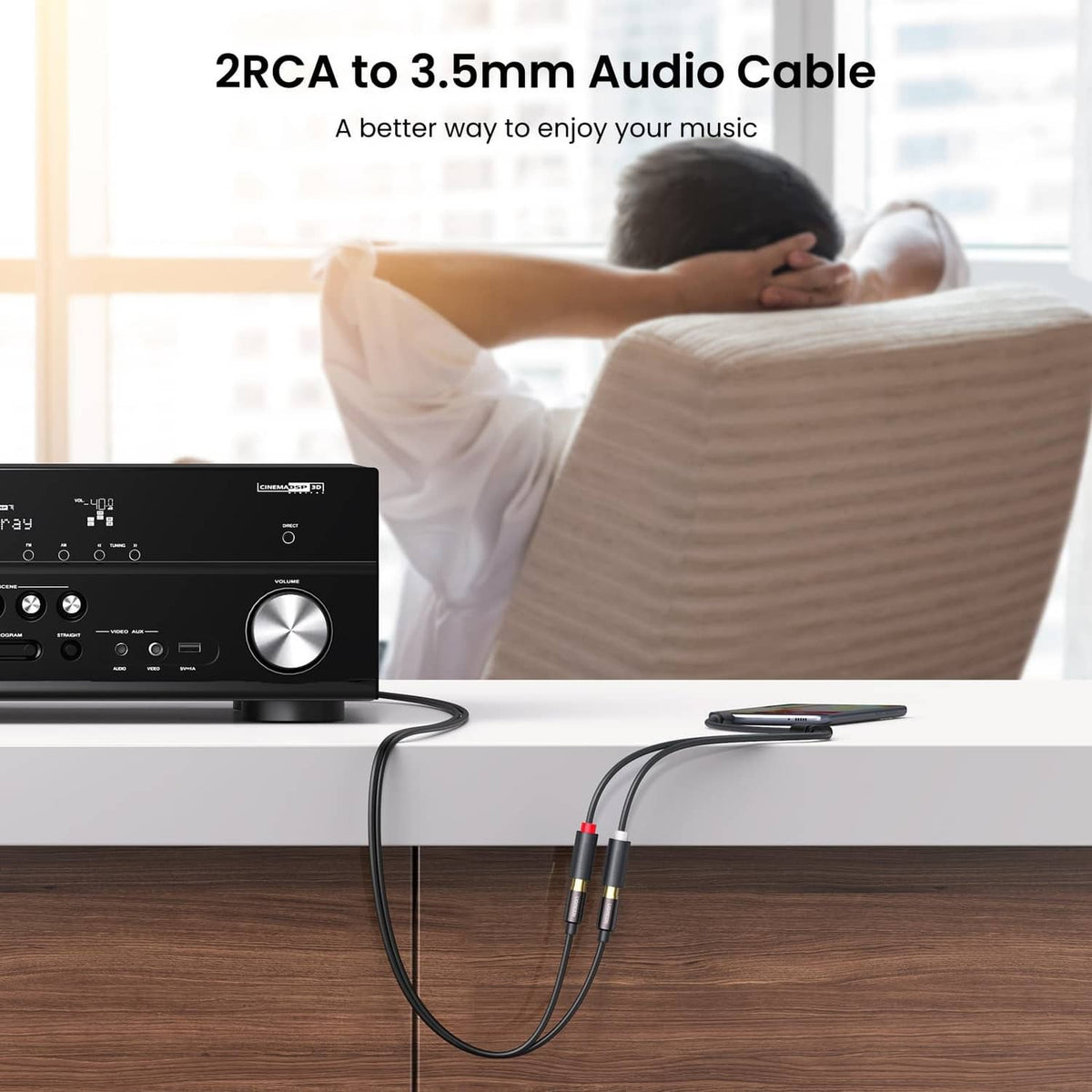 Dual RCA to 3.5mm audio adapter cable with black jacket and gold-plated ends