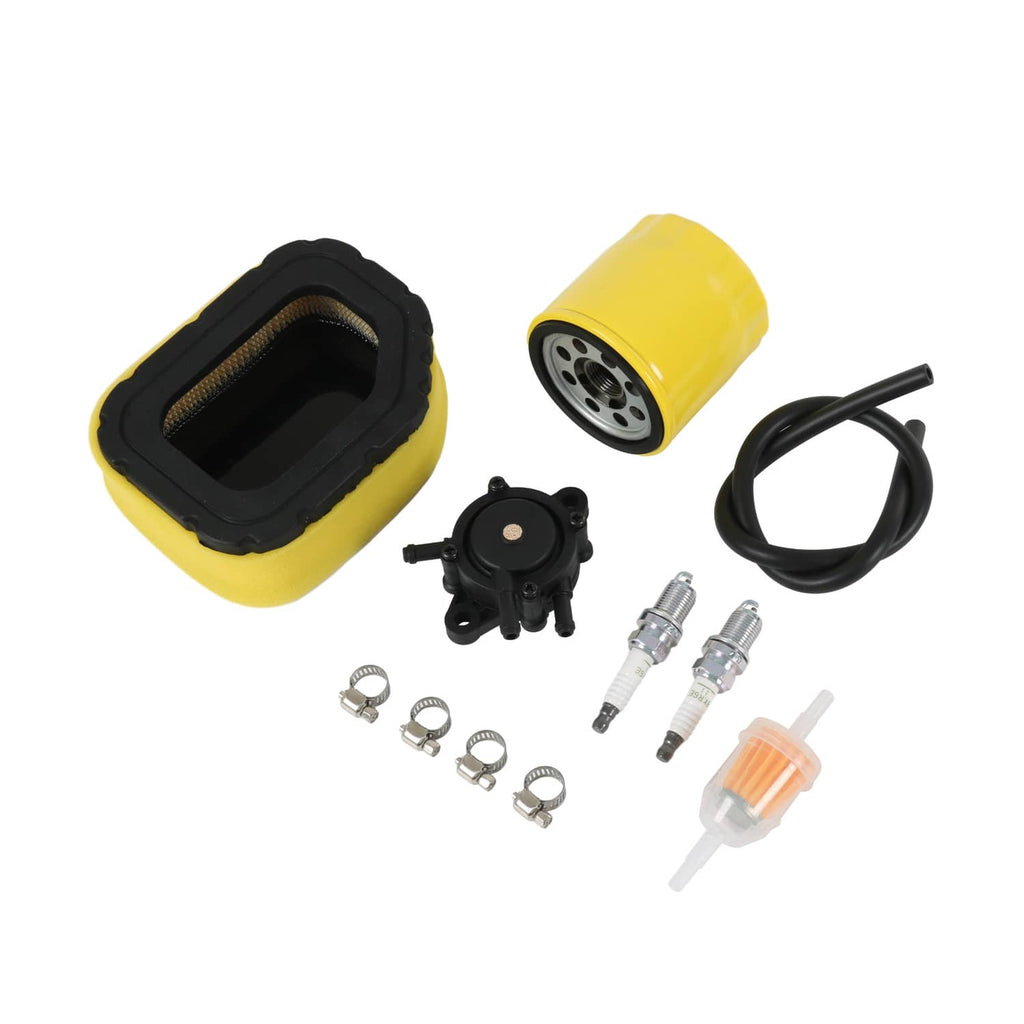 Air filter kit with yellow foam filter, black housing, valve, black hose, fuel line and two plugs
