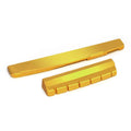 Gold-plated brass acoustic guitar nut and saddle set, shown together.