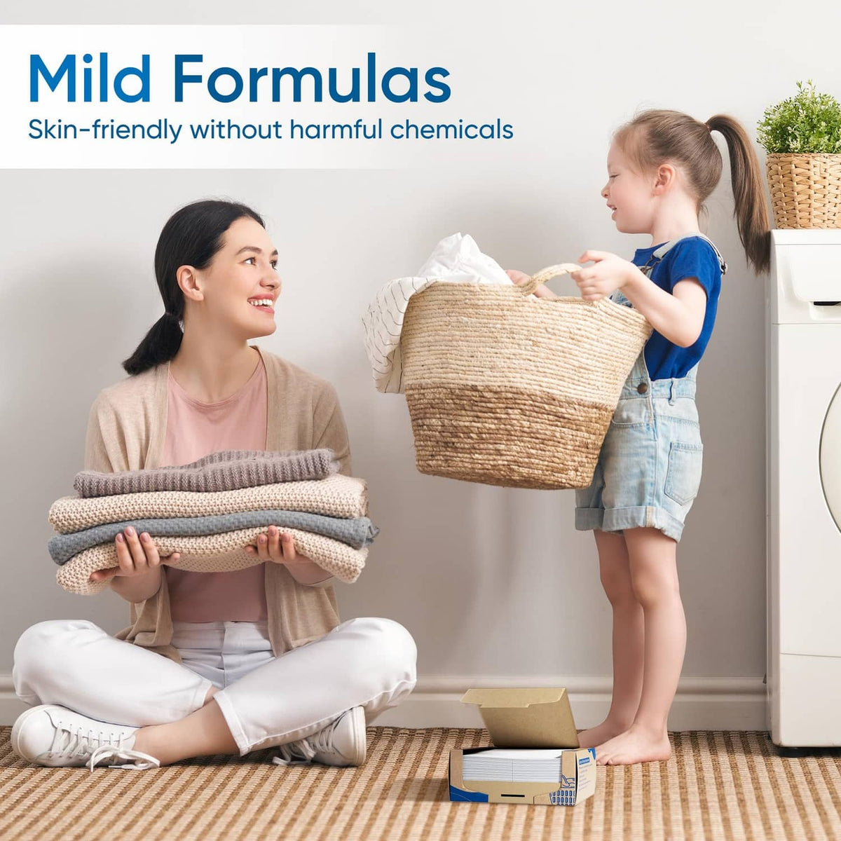 Gentle fragrance-free laundry detergent sheets pack shown with family doing laundry