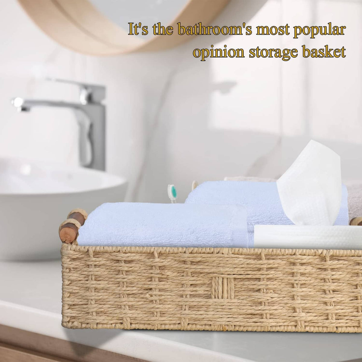 Beige woven paper rope storage basket with rope handles, open top on bathroom counter.