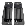 Black exterior door handle assemblies, textured finish, mounting holes visible