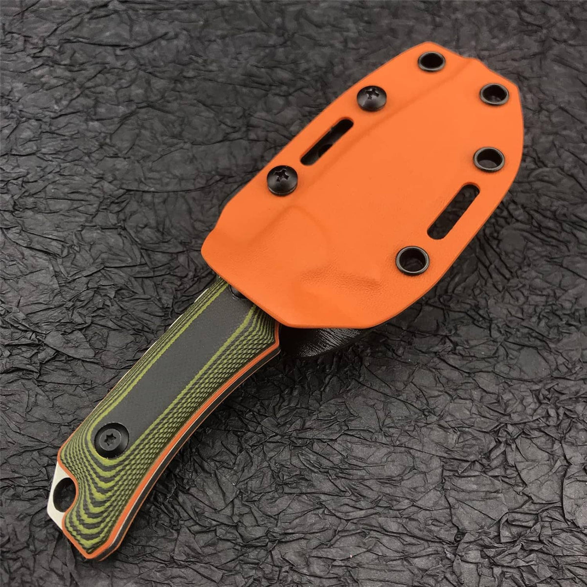 Fixed blade knife with orange Kydex sheath, green handle, four black mounting holes