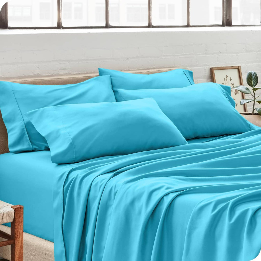 Turquoise king pillowcases set on a bed, showing two matching cases and overlap