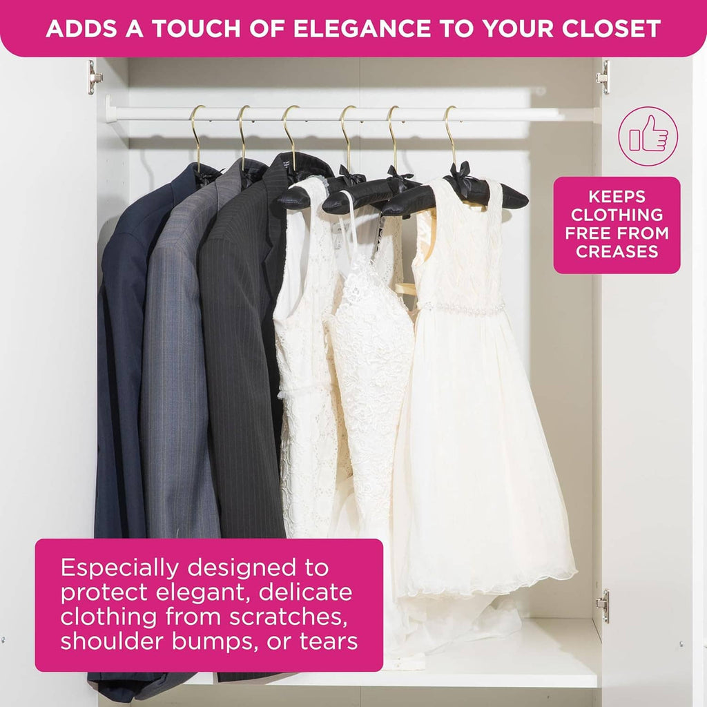 Assorted fabric padded hangers on closet rod with gold hooks and satin cloth covers