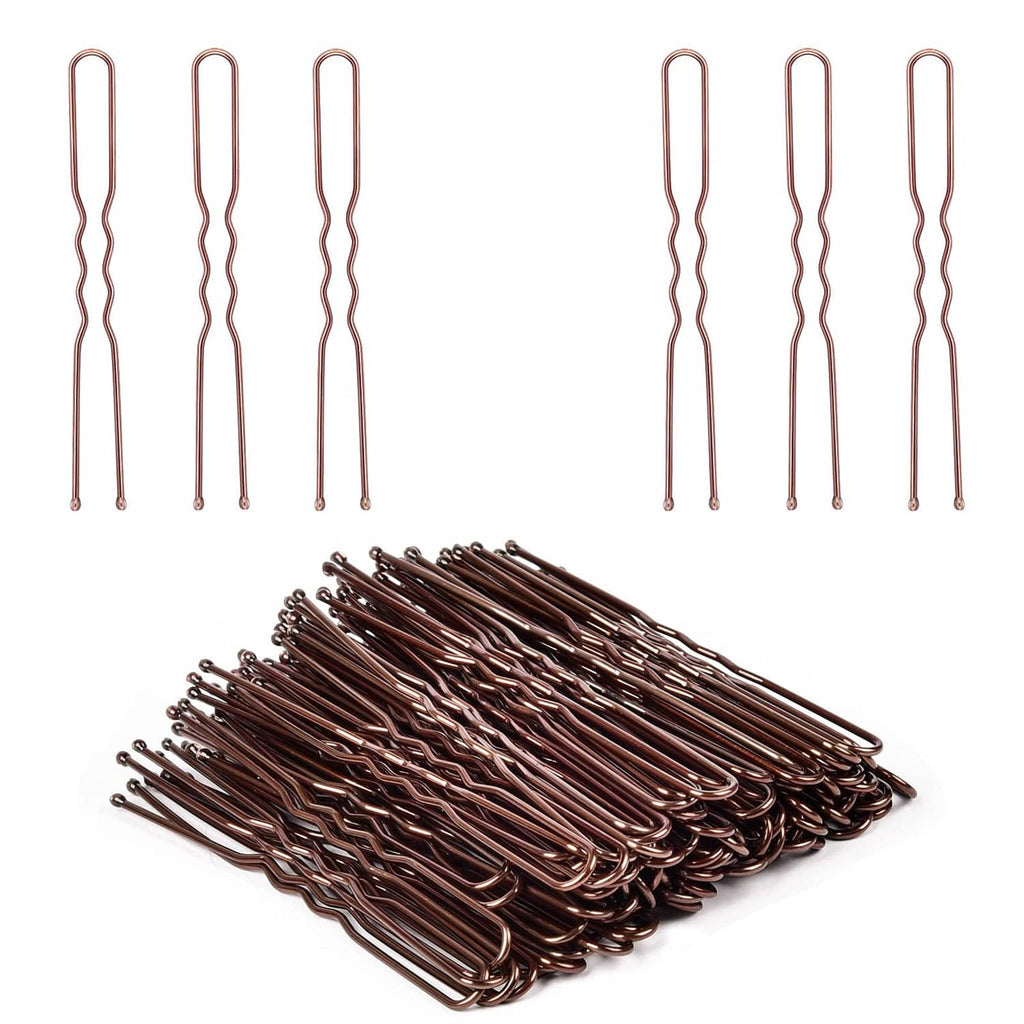 U-shaped hair pins in copper tone, several pins laid out and bundled
