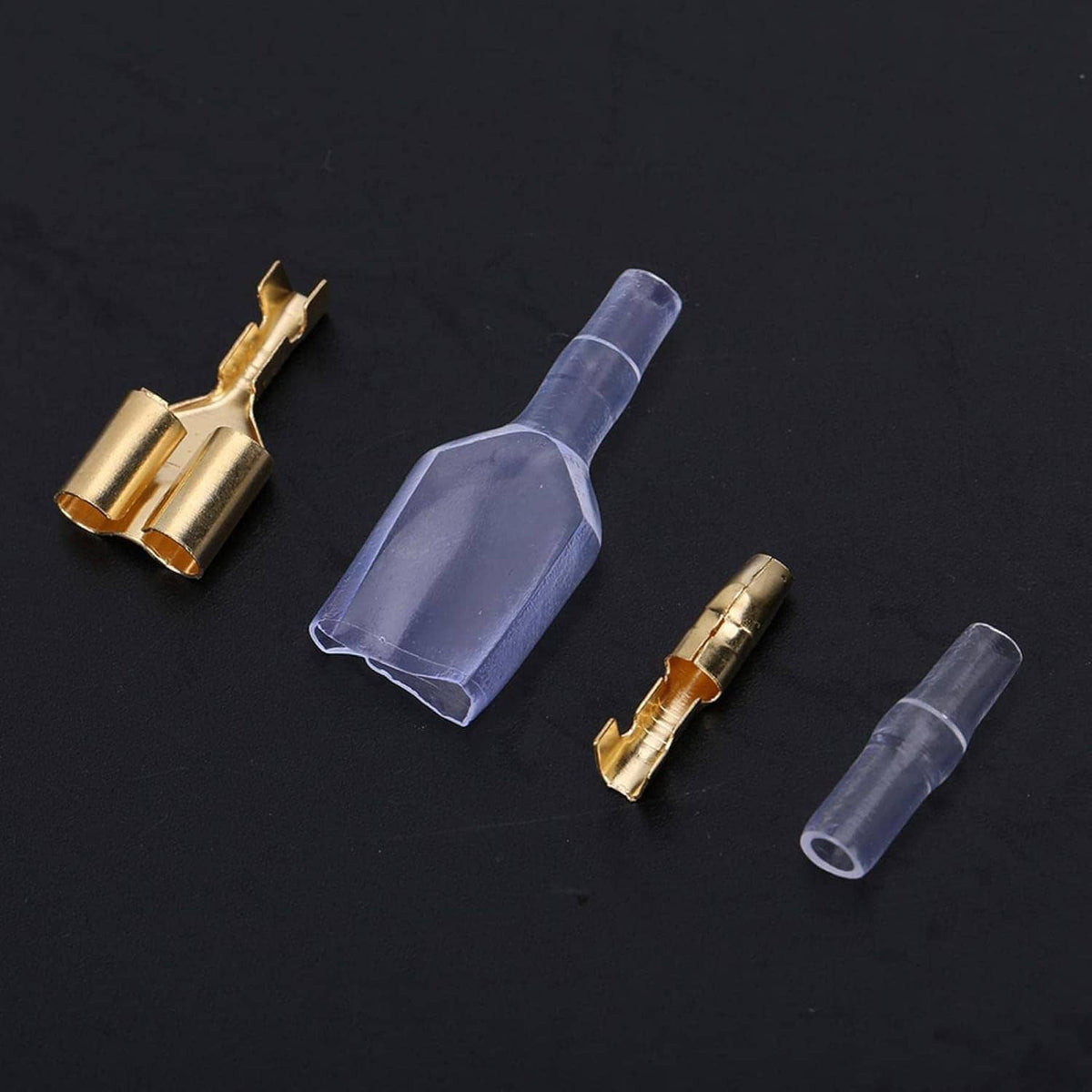 Gold bullet crimp terminal connectors with clear insulators, open end shown