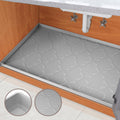 Gray under-sink waterproof silicone mat with raised cross pattern and rim edge