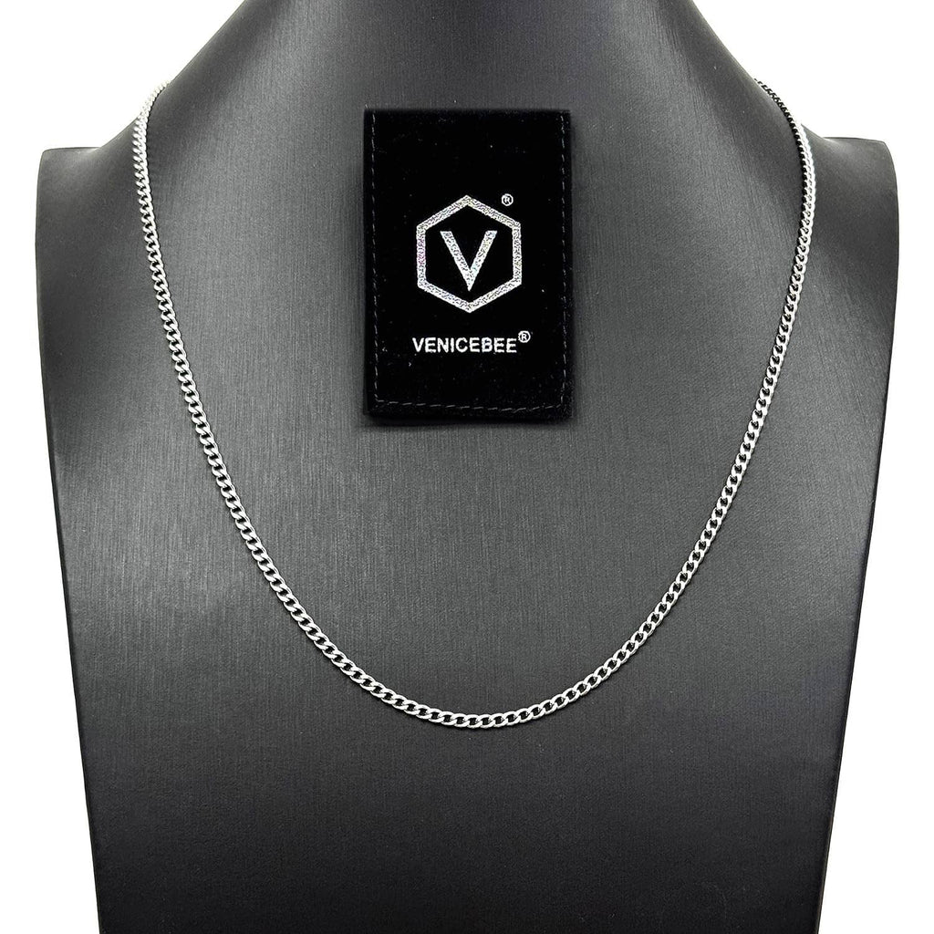 Stainless steel chain necklace on dark bust, curb links and VENICEBEE® logo tag