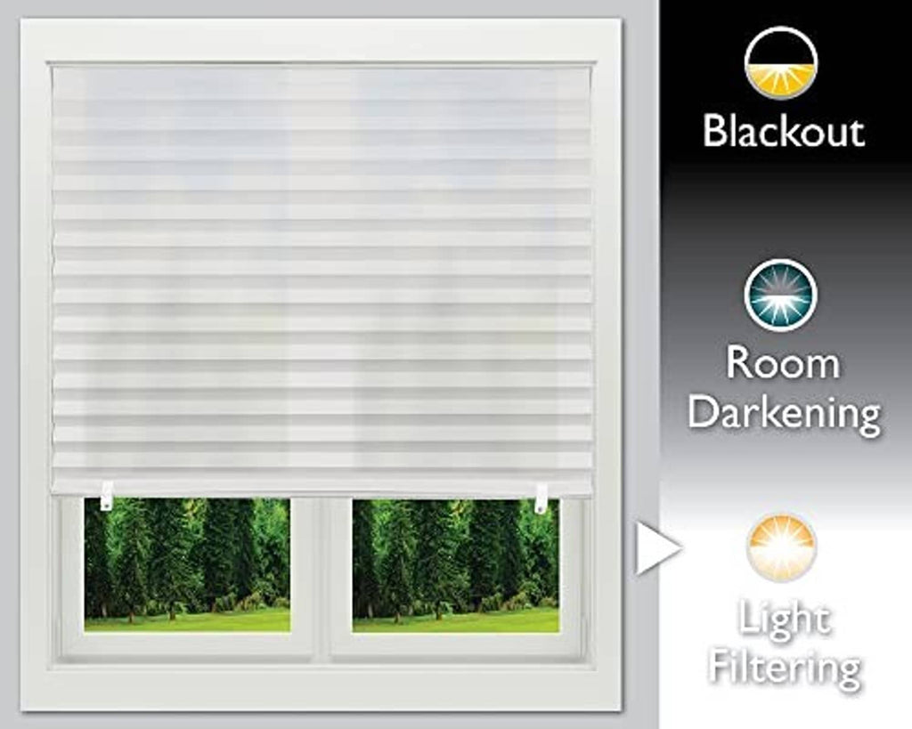 White-framed window shade with partially lowered pleated paper filter