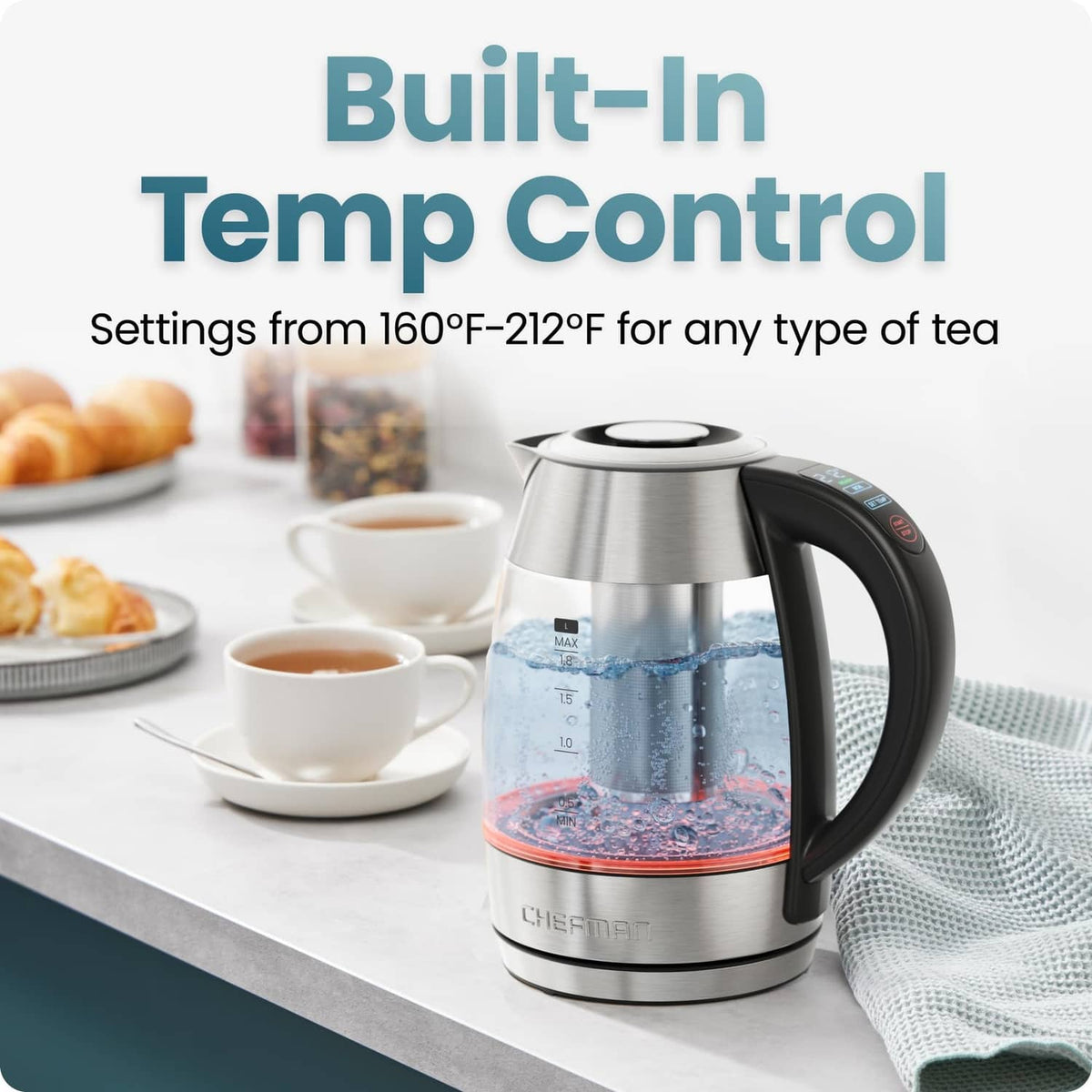 Stainless steel electric kettle with black handle and built-in temperature control panel.