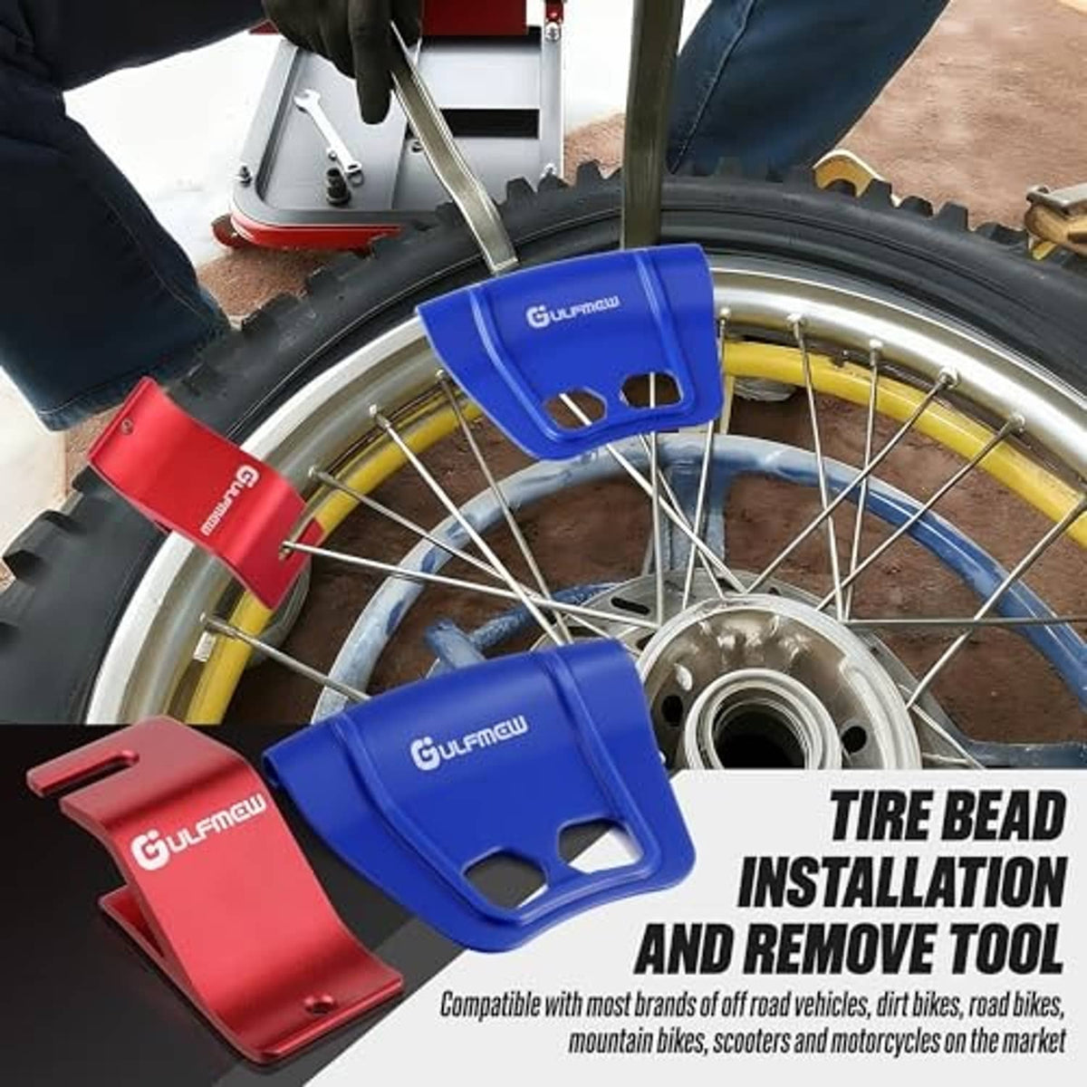 Blue tire bead installation/removal tool and red rim shield on motorcycle wheel