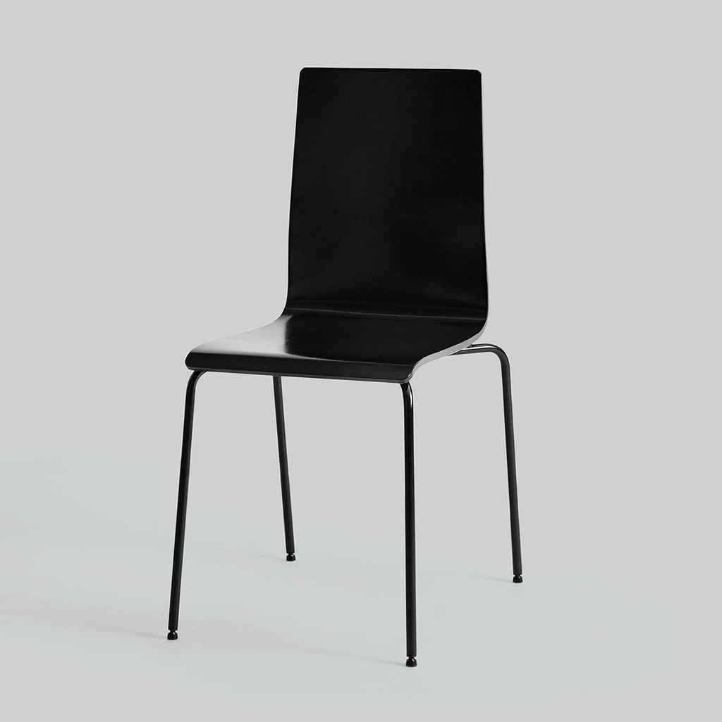 Paint coverage example: black padded dining chair with four straight metal legs.