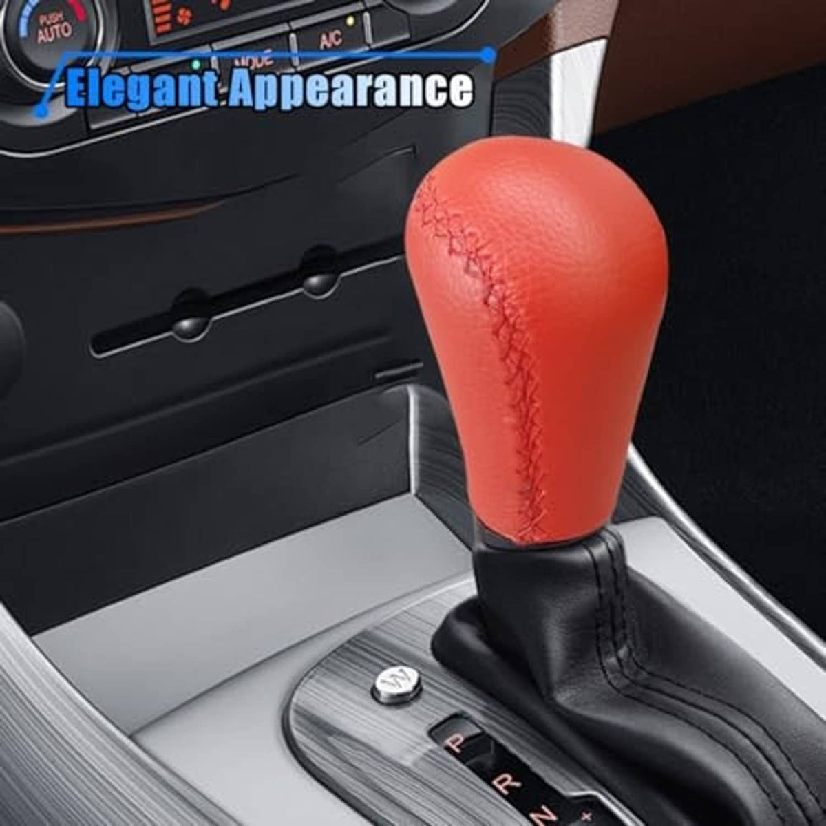 Red leather shift knob with black base installed in vehicle gear area