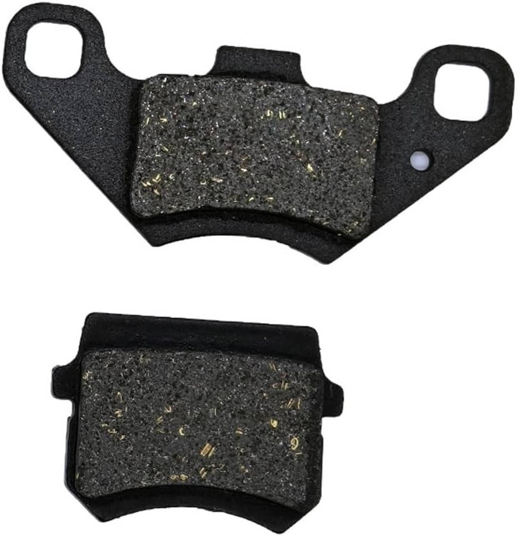 Front brake pad set with arched backing and dark pad face with scattered metal flecks