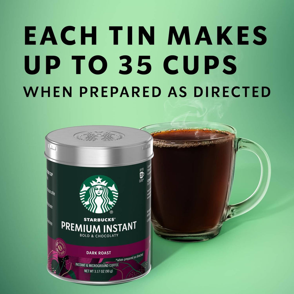 Starbucks Premium Instant Coffee dark roast can beside a glass mug filled with dark coffee.