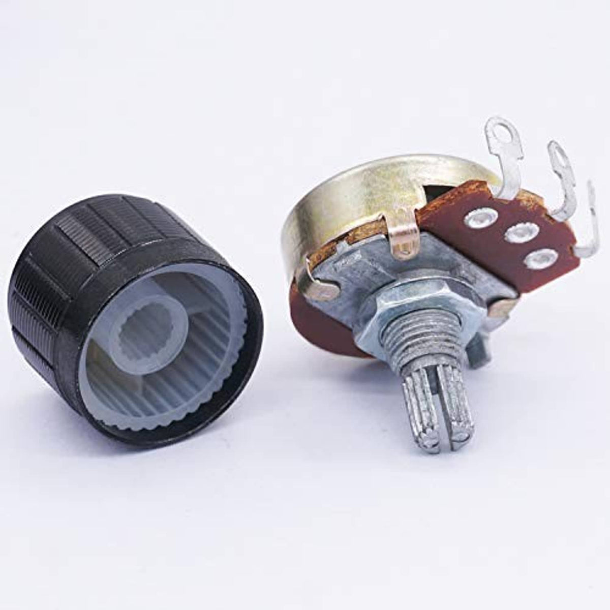 Black rotary potentiometer pair with threaded shafts and solder lug terminals