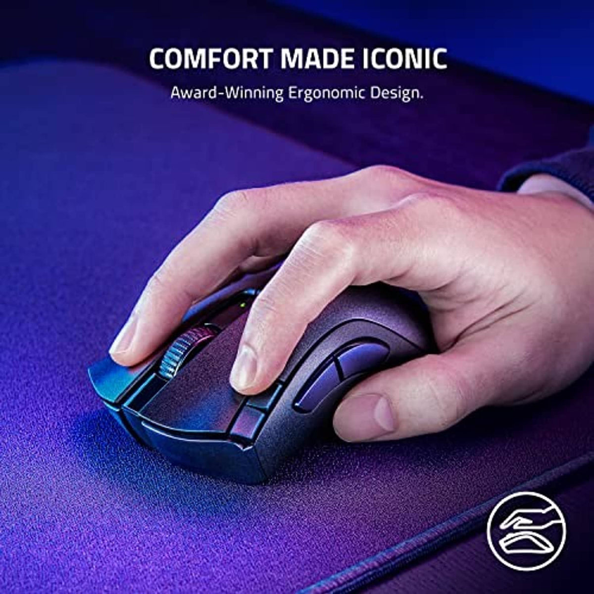 Black ergonomic gaming mouse held in hand, showing side grip contours