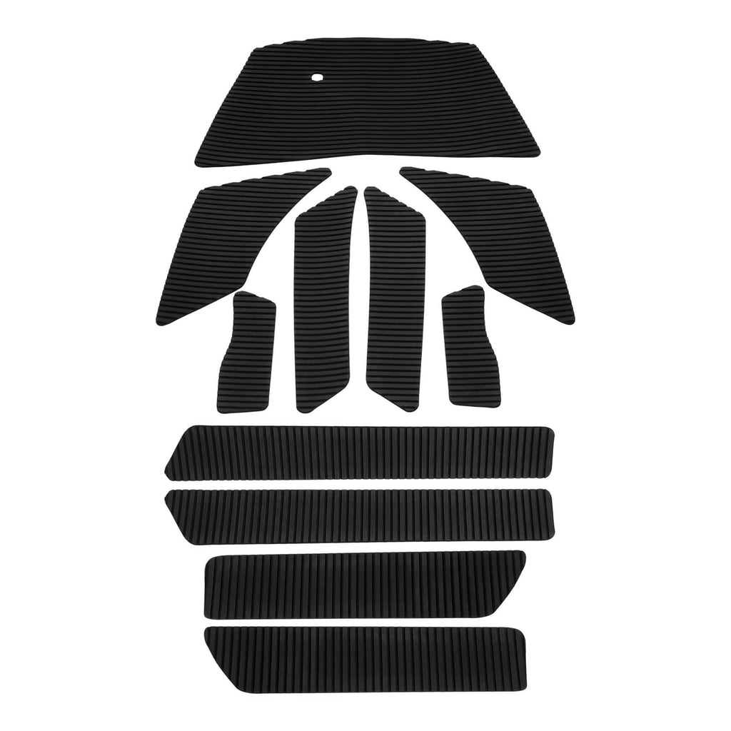 Black traction mat foot pads set, shaped panels with ridged texture and small holes