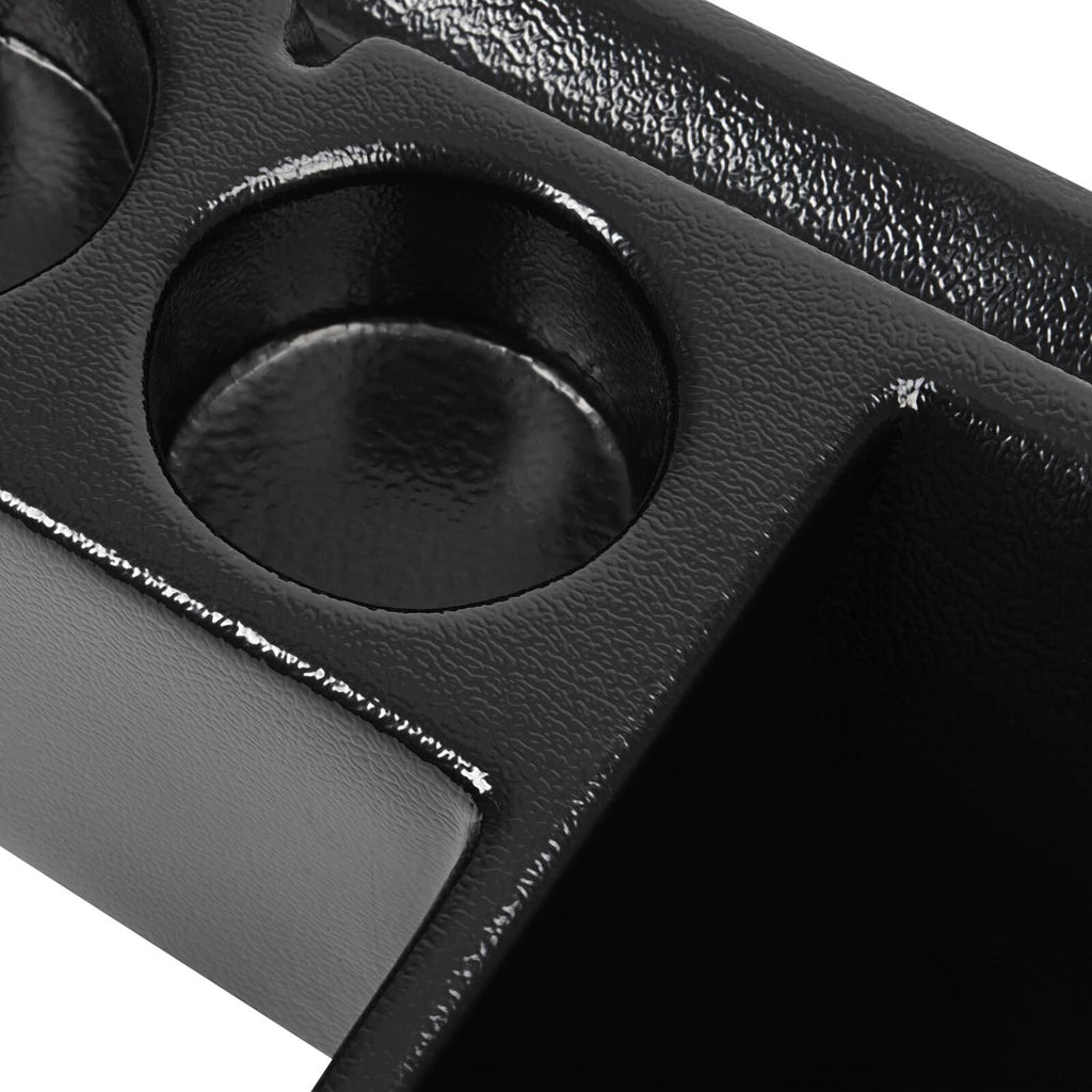 Close-up of black cab caddie with two cup-holder openings and textured surface.