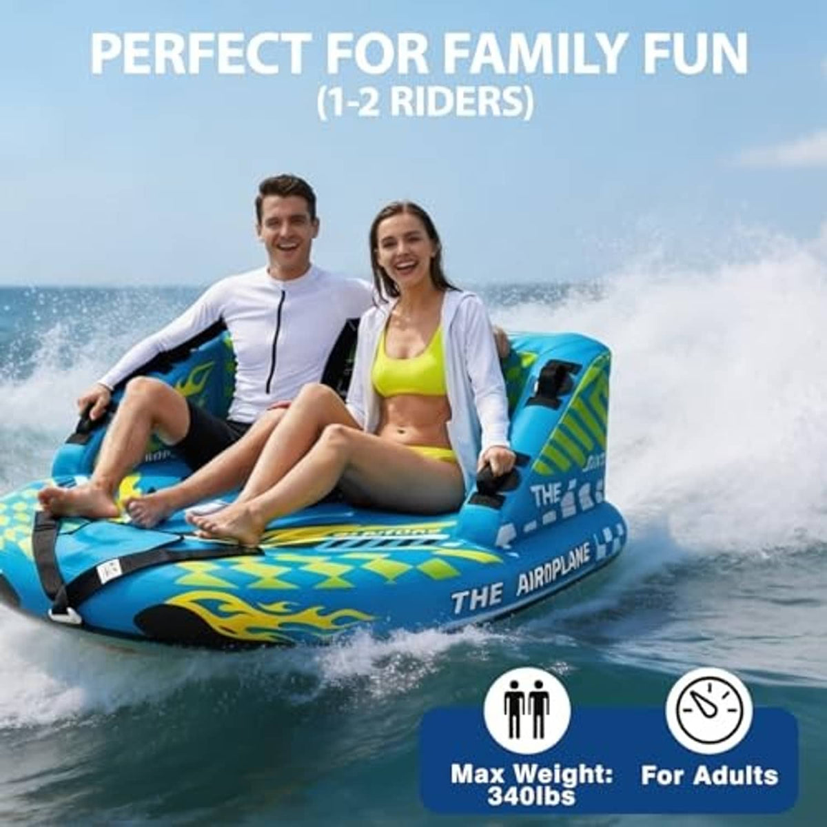 Two-person inflatable towable tube carrying two riders with safety grab handles