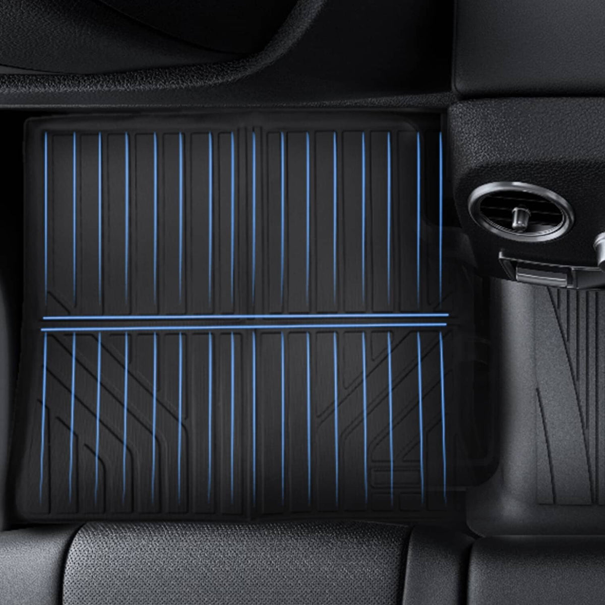Black cargo liner with vertical ribbed texture and raised outer edge