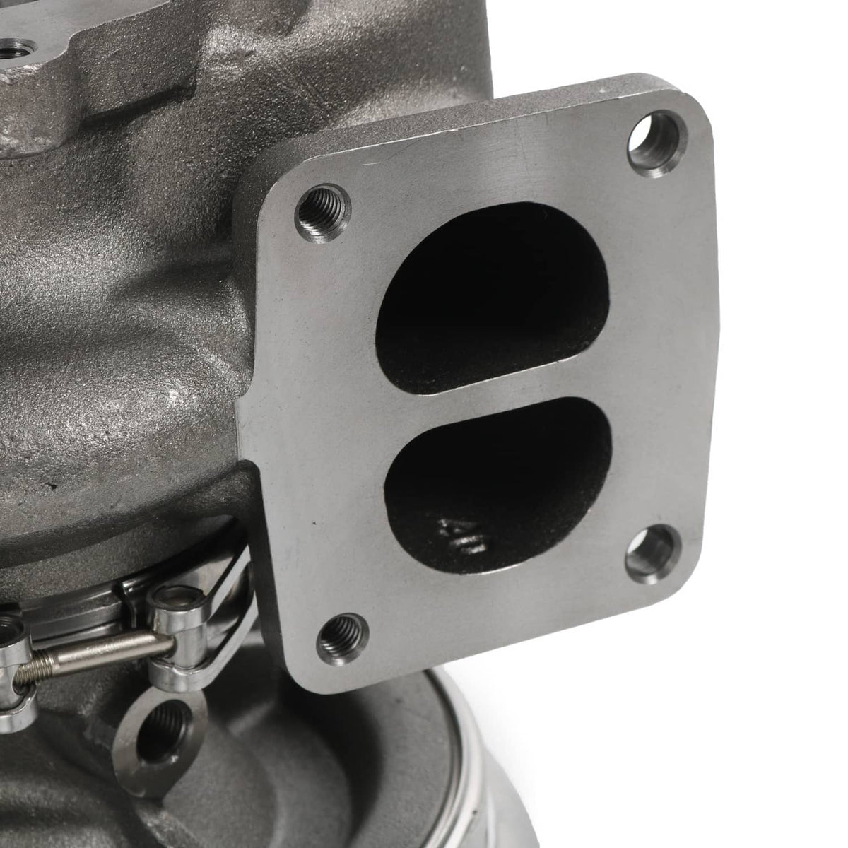 Turbocharger housing with dual oval ports and mounting bolt holes