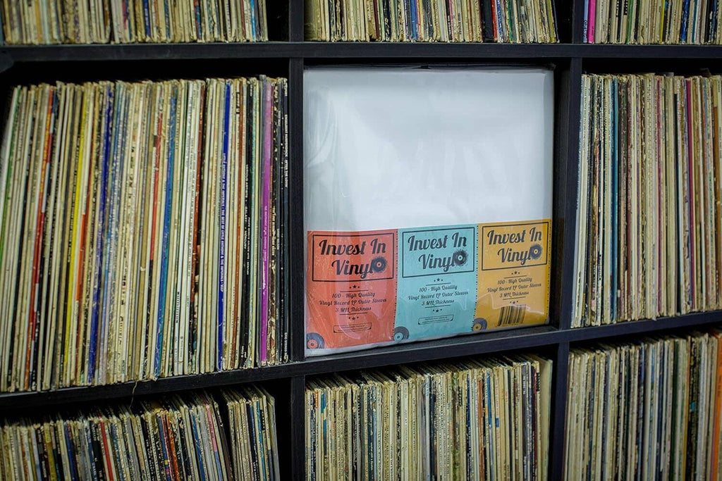 Vinyl shelf with clear LP outer sleeve packs displayed in cubby