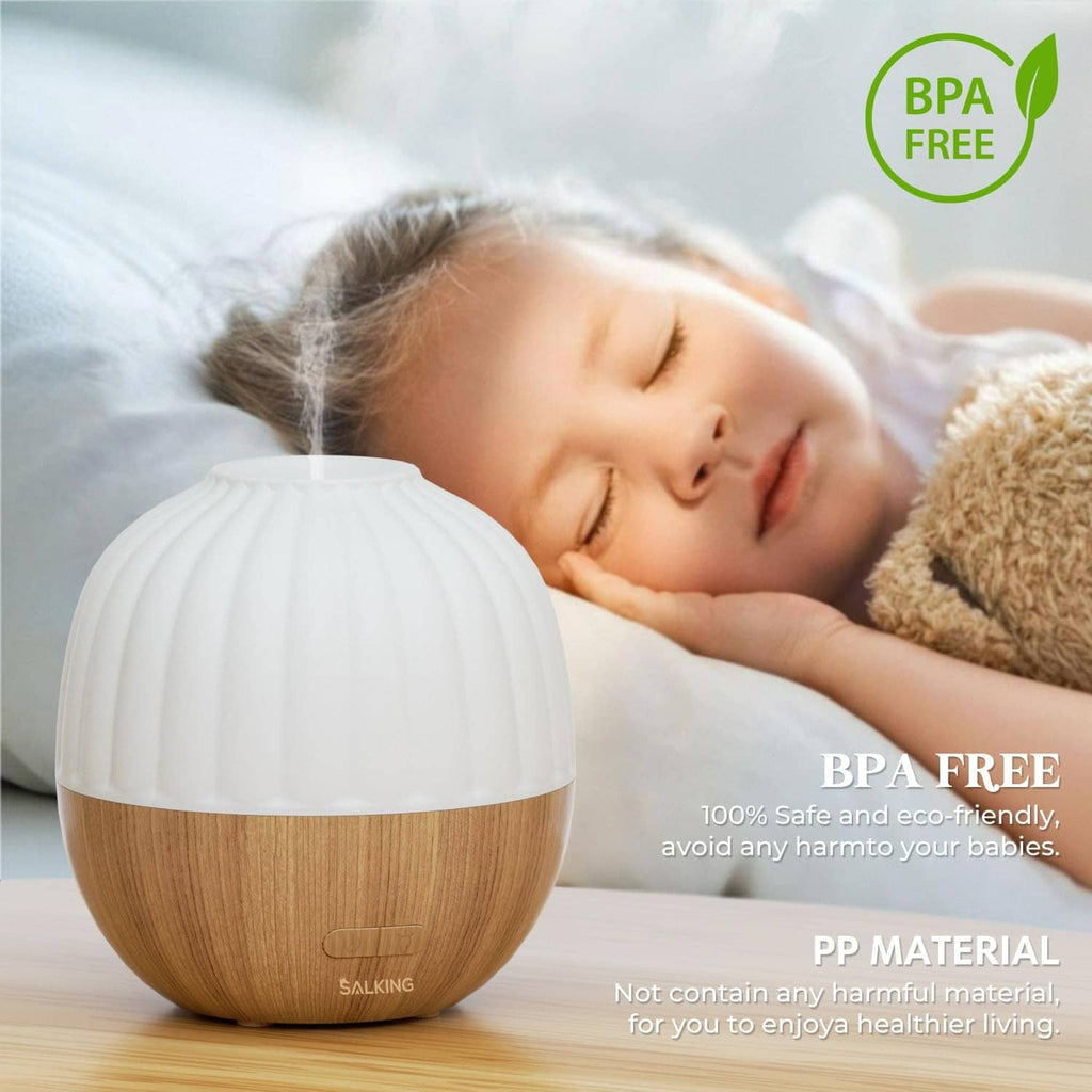 Wood-and-white essential oil diffuser with ribbed dome lid for bedside use