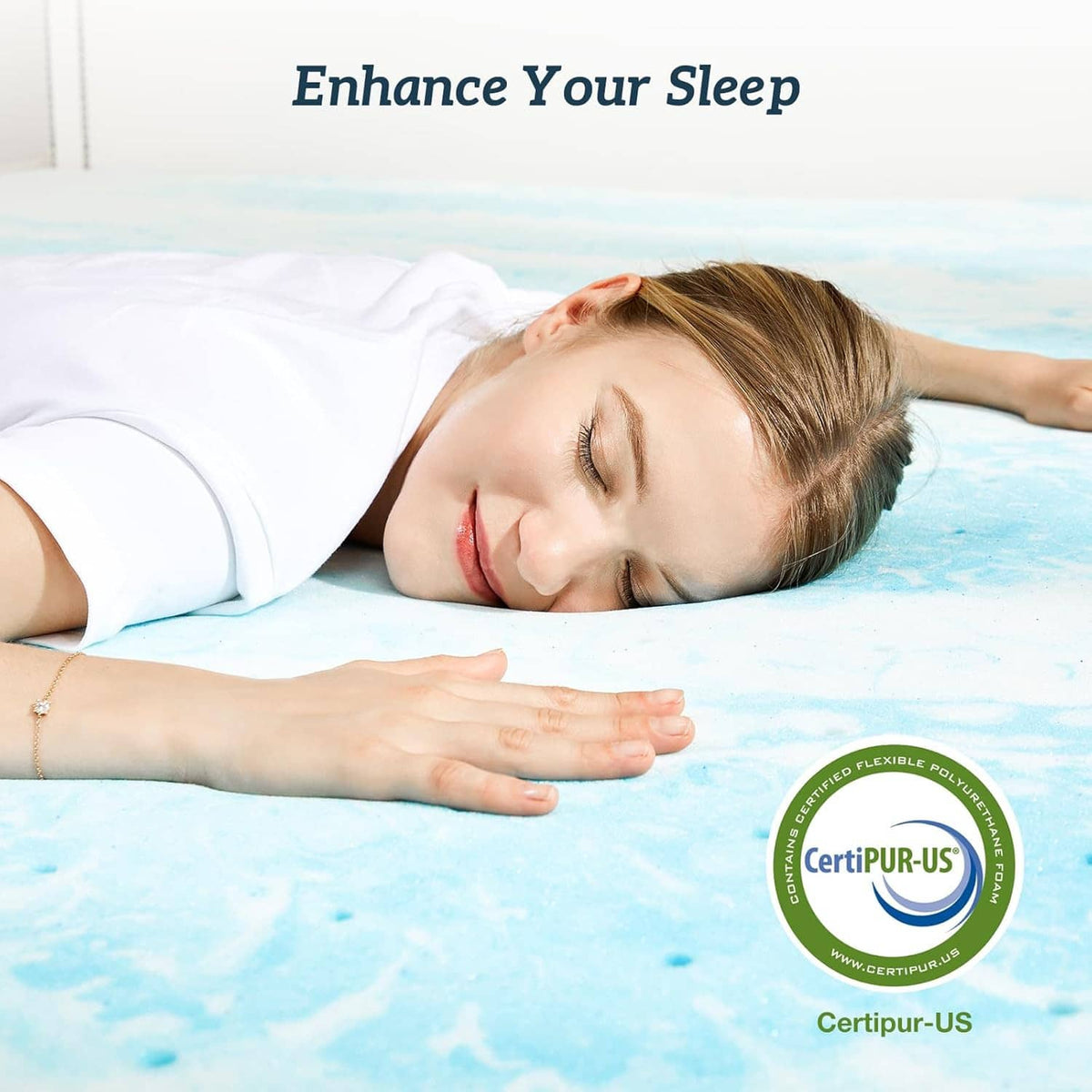 Blue memory foam mattress topper on a bed with sleeping person lying on top