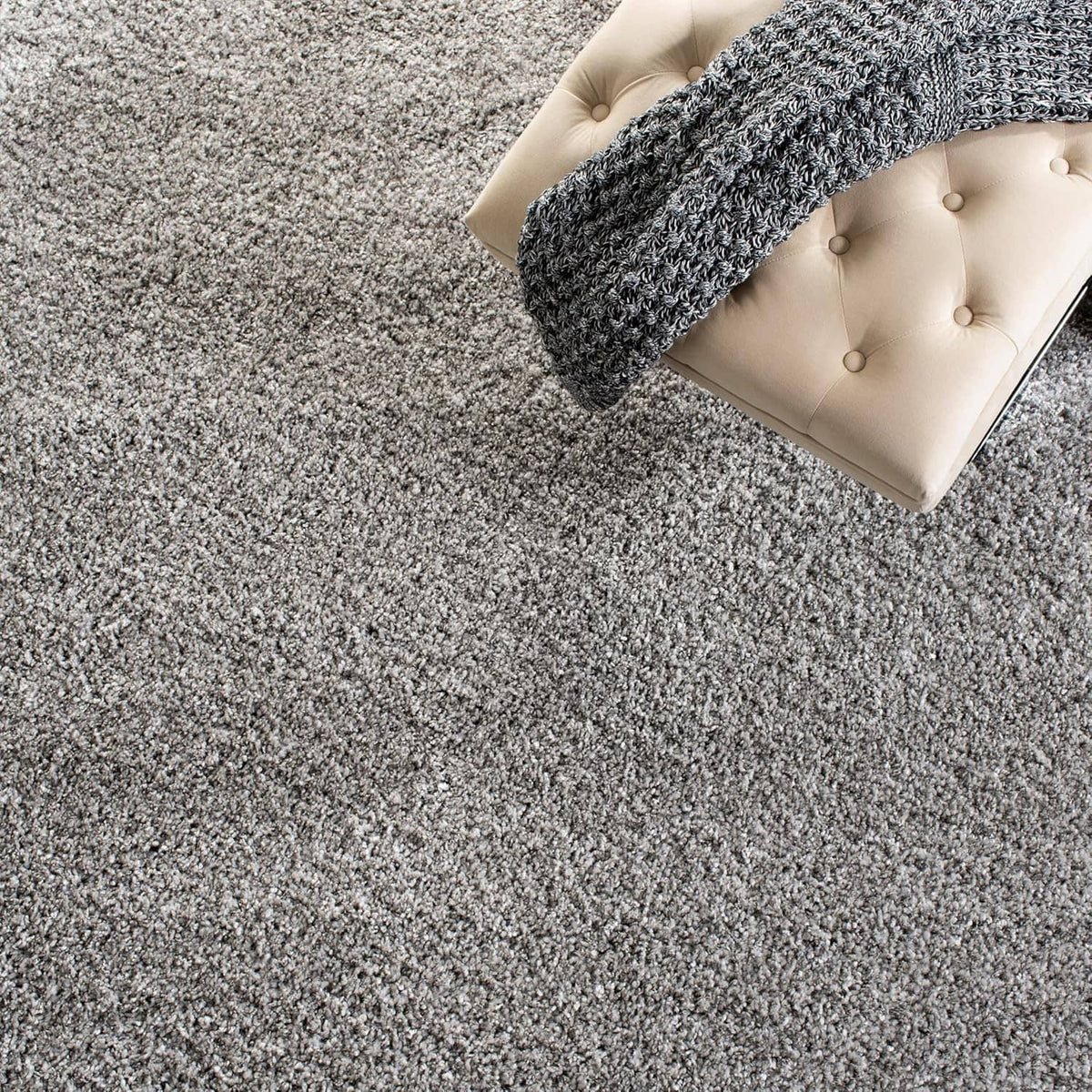 Silver shag area rug with thick speckled texture