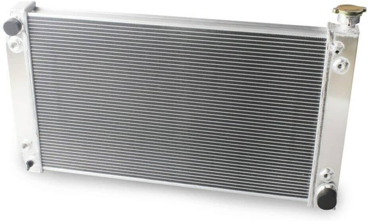 Aluminum radiator, 4-row, with side mounting brackets and inlet/outlet fitting on left