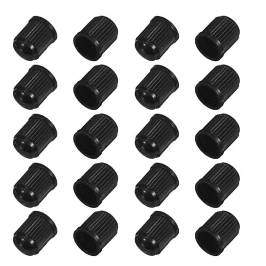 More black ribbed tire valve dust caps, multiple caps shown together