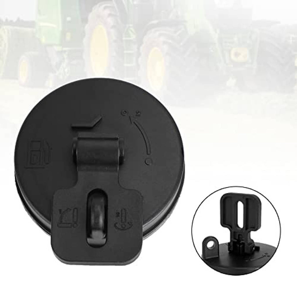 Black circular diesel fuel tank cap cover with latch clip and underside view