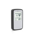 Black portable radon detector with LCD showing long/short term average readings