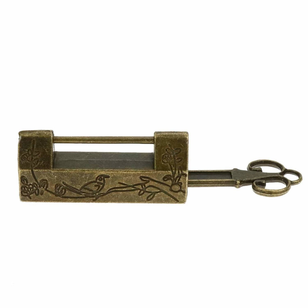 Antique bronze padlock with bird and flower engravings and attached metal key