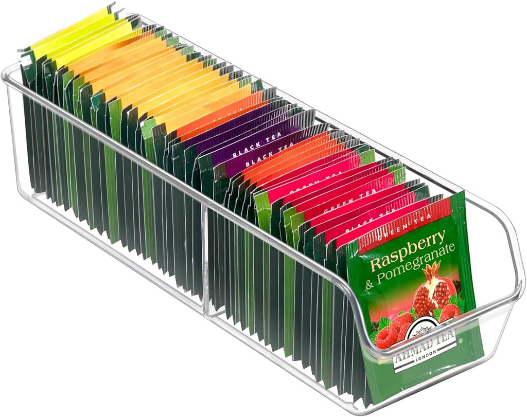 Clear tea bag storage bin with metal frame, filled with colorful tea packet sleeves
