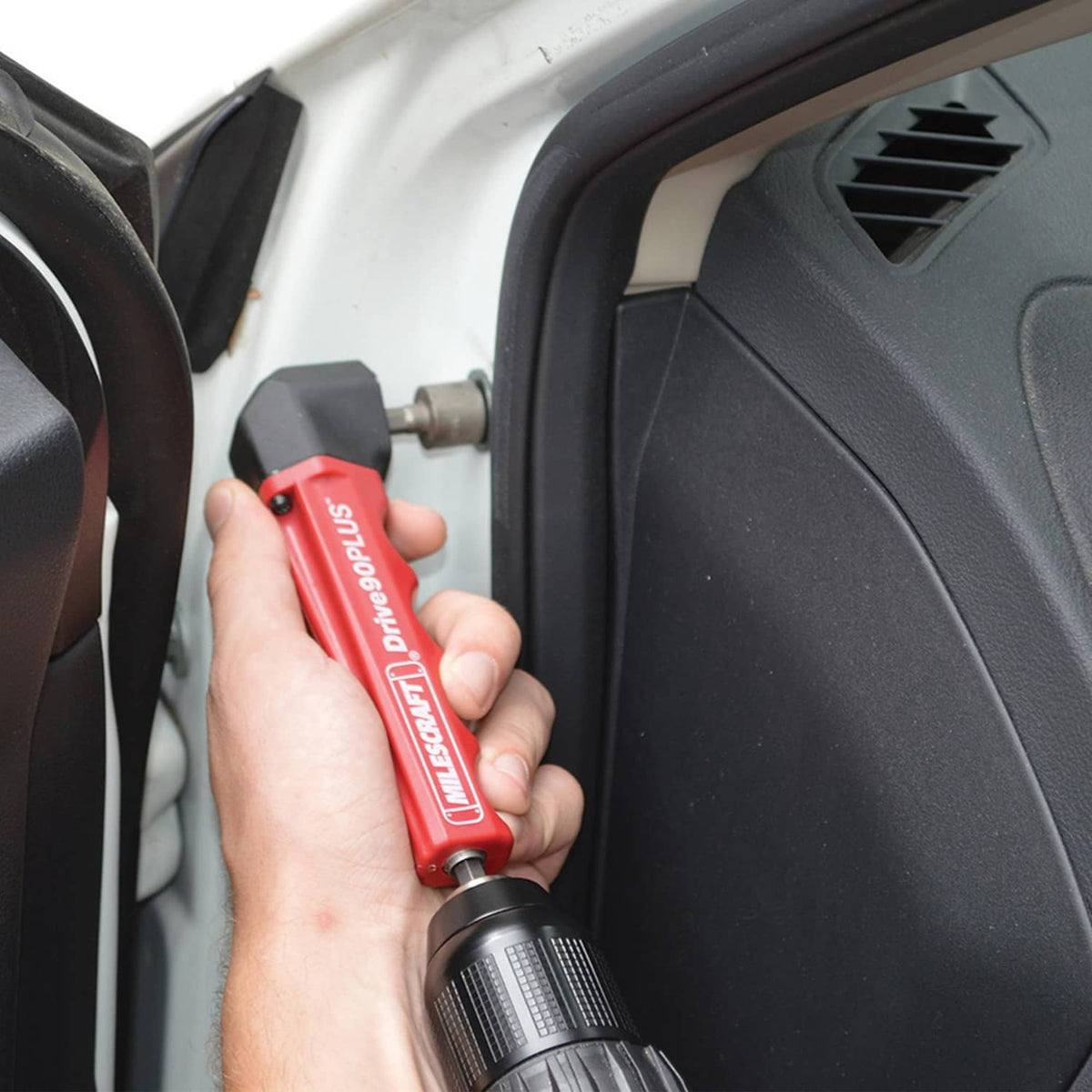 Milescraft right-angle drill attachment close-up, red body with metal drive shaft